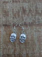 Boucles d'oreilles Tête De