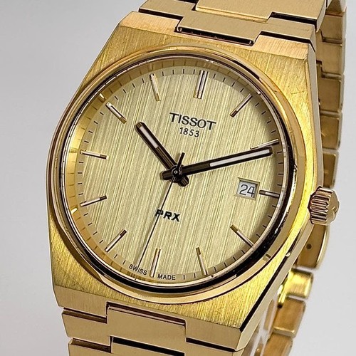 Montre quartz dorée tissot - quartz,