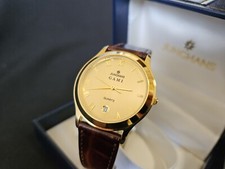 Montre JUNGHANS Ref: 41-7409 plaqué Or NEUVE FULL SET