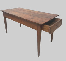Table de ferme en merisier massif comportant un tiroir . XIX siècle .