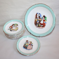 Service à dessert en porcelaine Ceranord contes de Perrault, 12 assiettes 1 plat
