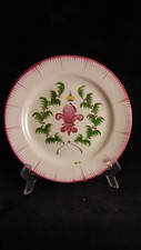 Assiette à décor de fleur de lys en faience de l'Est XIX ème