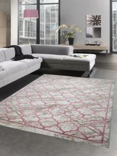 Tapis de salon avec motif marocain beige rose