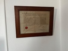 Document ancien encadré daté