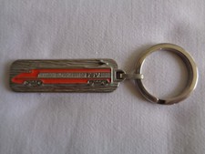 PORTE CLE  EN METAL EMAILLE