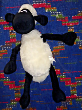 ST6/ PELUCHE SHAUN LE MOUTON BLANC NOIR NAMCO 2013 45 CM EXC ETAT