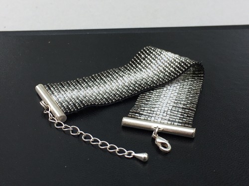 Bracelet manchette tissage