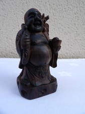 bouddha rieur en bois sculpté