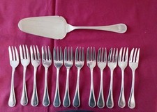 12 fourchettes à Gâteau et 1