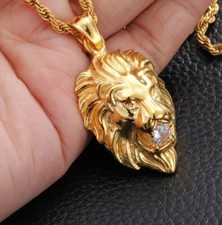 PENDENTIF TETE DE LION AVEC PIERRE DANS LA BOUCHE