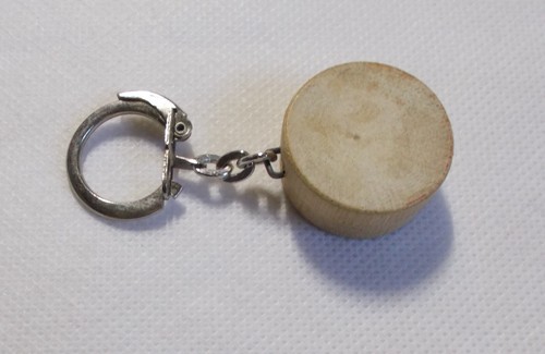 Porte clés boite ronde - , en
