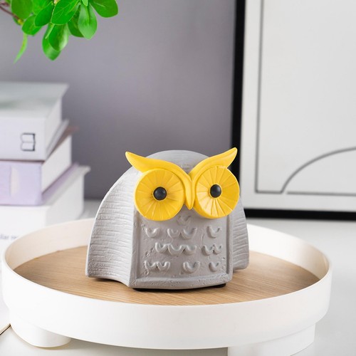 Statue hibou collectant une - de,