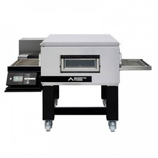 Four inox à convoyeur