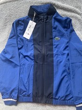 survêtement lacoste neuf avec étiquette dans sans emballage 