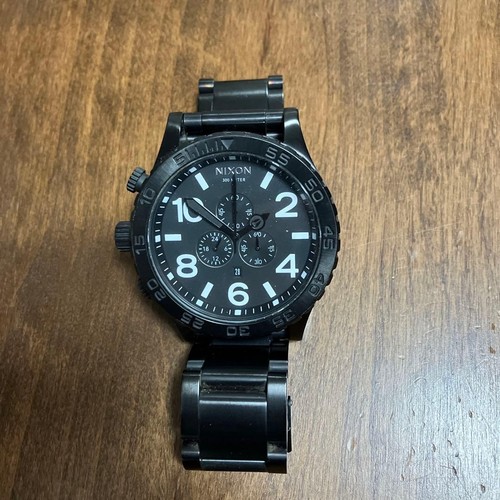 Nixon the black dial - nixon,
