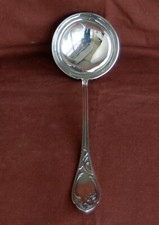 Grande louche en métal