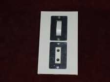 1 Interrupteur et 1 Prise 2P modèle Chambord Habillage Railux Gris Princesse