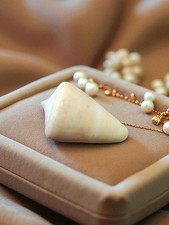 Ancien petit coquillage