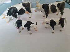 4 figurine vache noir et