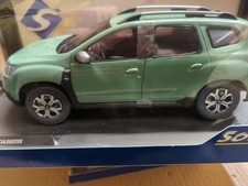 SOL1804609 - DACIA Duster phase 3 2023 vert - Solido - 1/18