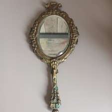 Ancien face a main bronze