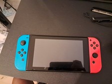 Console Nintendo Switch V2 (1.1) Avec 1 Joy - con Rouge Néon + 1 Joy - con Bleu