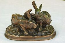 DEUX LAPINS EN BRONZE SIGNE PJ