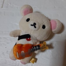 Guitare peluche Rilakkuma