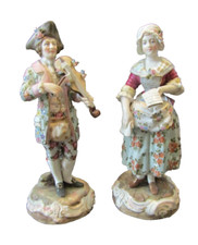 Couple de figurines en