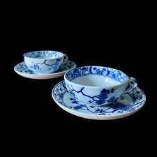 PAIRE DE TASSES À THÉ &