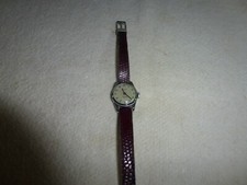 TRES BELLE MONTRE FEMME