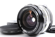 Objectif Nikon NIKKOR-N Auto 24 mm F2,8 non-AI MF avec capot et étui HN-1...