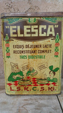 Ancienne Grande Boîte publicitaire ELESCA   en fer lithographié   H30 cm