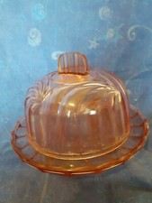 Petite cloche a fromage avec sont plateau , en verre ambré vers 1940 50