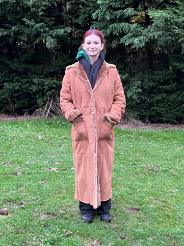 Manteau fausse peau retournée