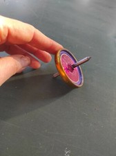 Jouet ancien Toupie en métal litographiée