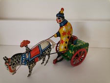 Jouet tôle cirque clown sur