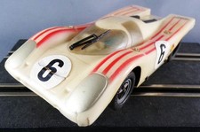 Carrera Universal 40463 - Porsche 917 Lexan Blanche Bandes Rouges N°6 sans Boite
