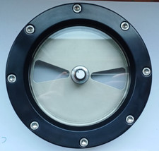 Hublot à cache rotatif