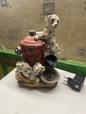 Fontaine chien en resine tres