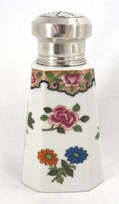 Saupoudreuse en porcelaine et