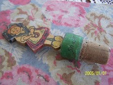 Ancien bouchon en bois et liège représentant une Alsacienne. Souvenir Strasbourg