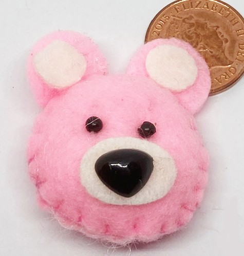 Coussin tête ours rose pour - tête,