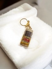 Porte-clés publicitaire vintage ancien, collection rétro, objet publicitaire d'o