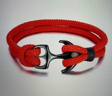 bracelet   fantaisie en corde rouge , fermoir  ancre noir