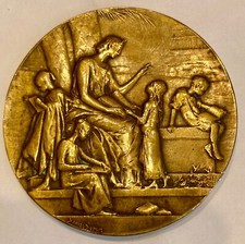 MEDAILLE en BRONZE signée