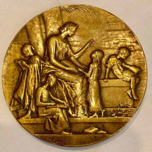 Medaille bronze signée - en,
