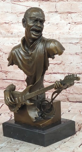 Sculpture figurine musicien - de,