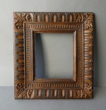 cadre ancien en bois sculpté