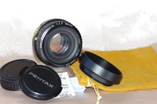 Objectif 50mm f1,7 PENTAX A monture PK avec bouchons, pare-soleil et housse TBE